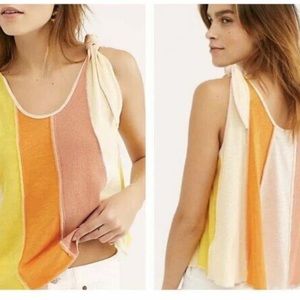 Free people size small tank top. Ties on the shoulders. Color blocked.